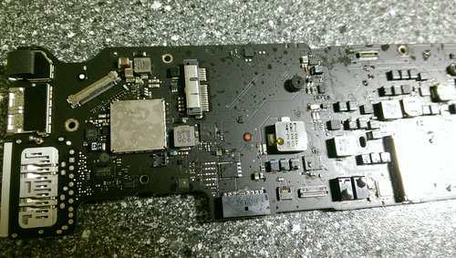 Logic Board innsauset med coca-cola